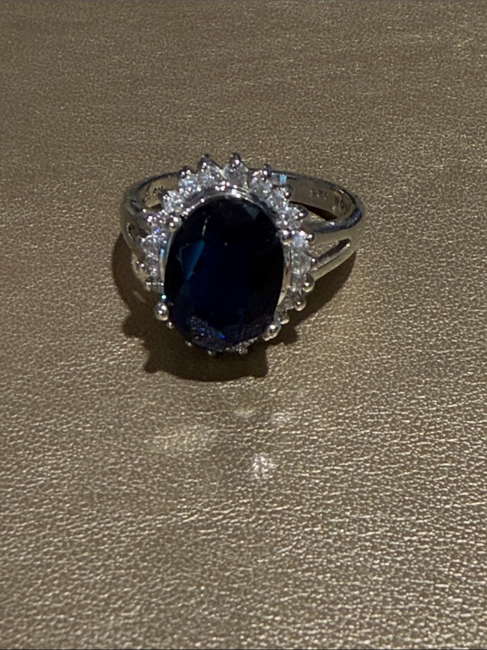 Avon Silver-Tone Ring with Deep Blue Center and Clear Halo
